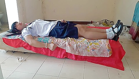 Asian beauty with a long hair shows off her boobs on beach