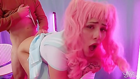 Redheaded babe is getting fucked from behind by a big dick