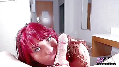 Tattooed hottie with a sexy smile in a long red dress