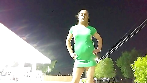 Transvestite transvestite showing off her ass in public