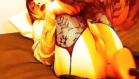 Busty brunette babe undresses naked and plays with her toy