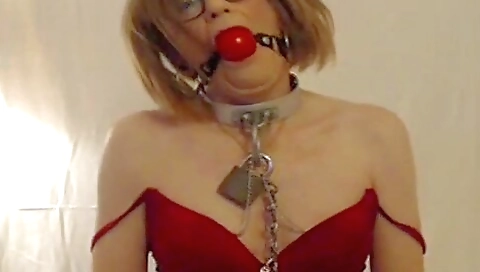 Busty brunette with a pair of stockings and a red head