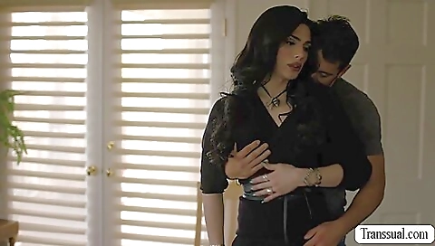 A brunette trans babe is deepthroated and fucked in her ass