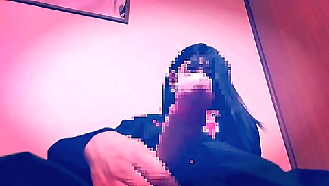 Asian babe masturbates her shaved pussy in front of the camera