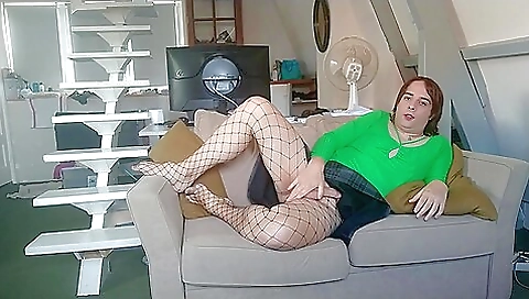 French redhead gets her pussy penetrated in front of the camera